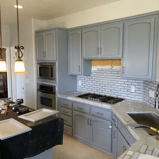 Golden oak to grey urethane cabinets job