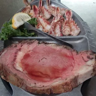 Slow roasted prime rib with rock shrimp surf and turf dinner