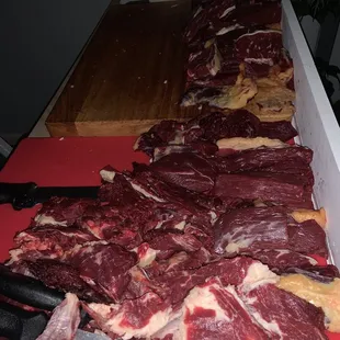 meat being prepared on a cutting board
