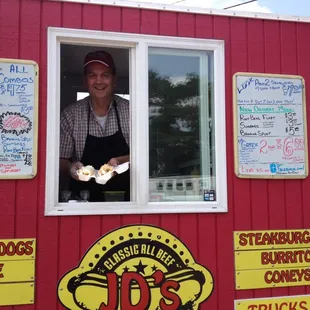 Jim at his best! Serving a fiesta dog!
