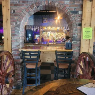 a brick fireplace in a restaurant