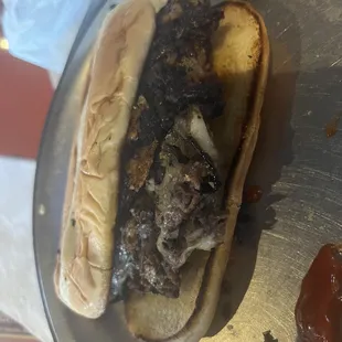 a beef sandwich on a bun