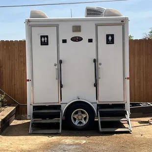 a white restroom trailer