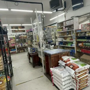 a grocery store with shelves full of goods