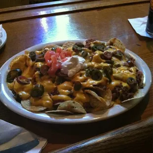 We shared these supreme chili cheese nachos. They were very tasty!