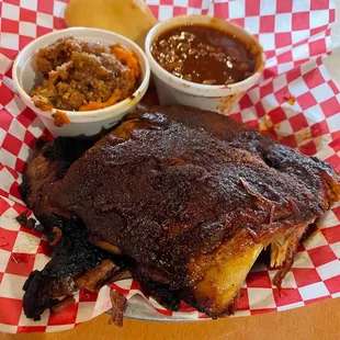 a plate of ribs and sides