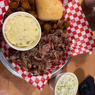 Pork pulled barbecue plate with jalapeño cheese grits, okra, and slaw
