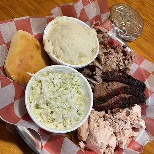 Brisket, chicken, and pork....brisket was my fav. Rolls were yummy, coleslaw - standard, loaded mashed potatoes....Id not do again.