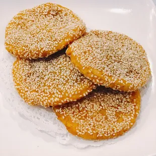 a plate of sesame cookies