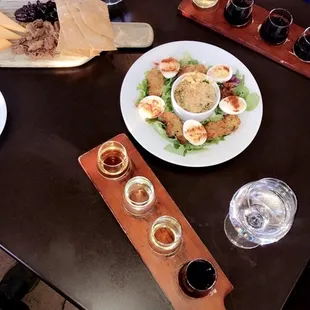 Cheddar board, fried oysters with deviled eggs and a Brussel sprout slaw. Along with 2 wine flights