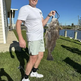 Great fishing behind the cabins!  34 in 24lbs monster