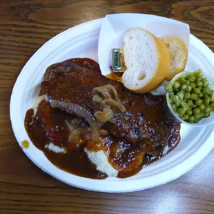 This is Tuesday, Hamburger Steak, mah, peas, bread, drink, $12.00 The flavor was excellent, well worth the visit.A gem in the rough!