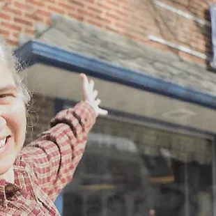 a woman holding a pastry