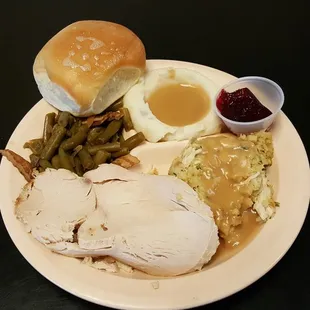 Turkey and dressing, Jeannie's homemade cranberry sauce.