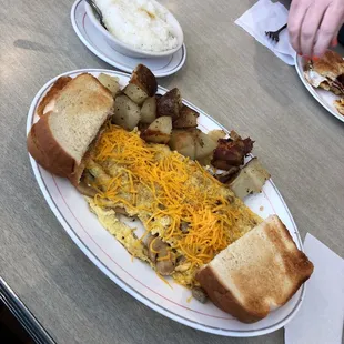 Webster omelette with grits