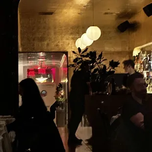 people in a dimly lit restaurant