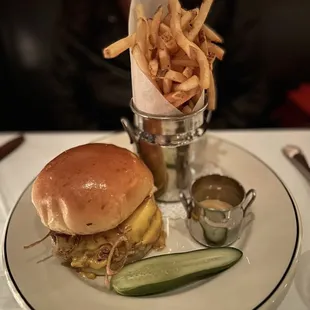 a plate with a sandwich and french fries