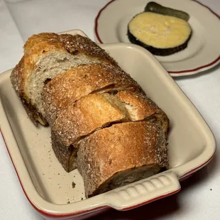 a loaf of bread and a pickle