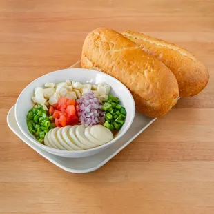 Special Ful
(fava beans + spices + tomato + green onion + red onion + jalapeno + hard boiled egg + feta cheese served with roll of bread)