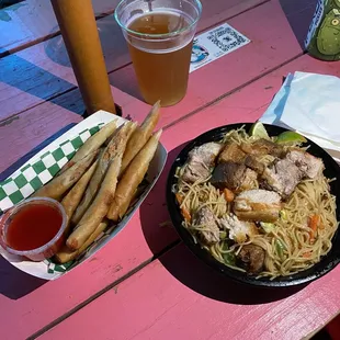 Egg rolls and pork noodle dish