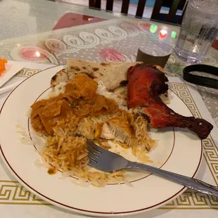 Chicken curry, naan, and chicken