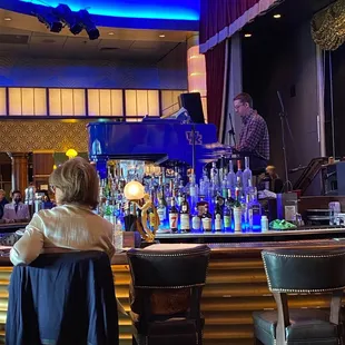 Live piano playing in the bar