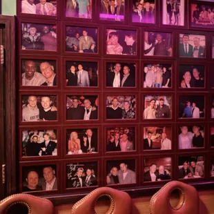  a wall of family photos