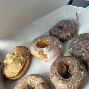 2 blueberry cake 2 apple fritters 1 glazed and 1 Carmel apple