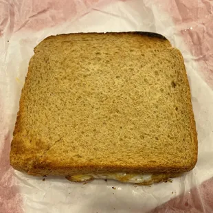 Egg and cheese on whole wheat.  Simple and cheap.