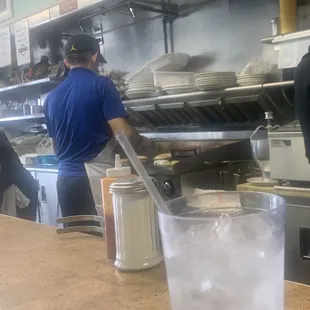 Old school breakfast counter with the flat top grill.