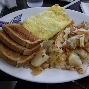 Turkey sausage omelet with home fries