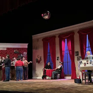 a group of people on stage