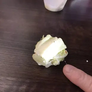 Lettuce butt or stem , not sure what this called but rather careless that it ended up in my salad.