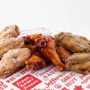 a plate of fried chicken wings