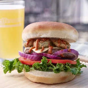 a burger and a glass of beer