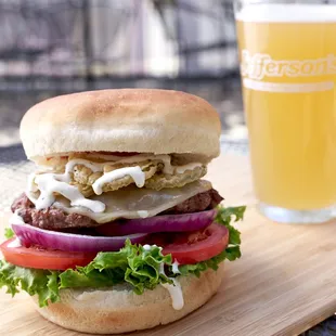a burger and a glass of beer