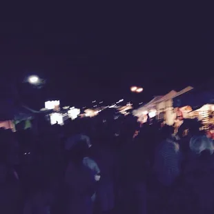 Walking the streets, eating festival food, listening to rock.