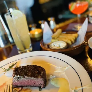 Niman Ranch filet with frites and cocktails. Best bar seat in town.