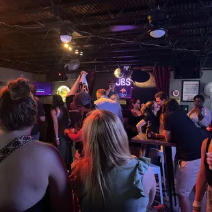 a crowd of people at a party