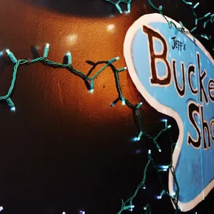 a sign with christmas lights