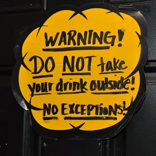a warning sign on a door