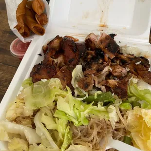 Chicken teriyaki, pancit, and lumpia.