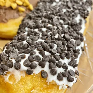 two donuts with chocolate chips on them