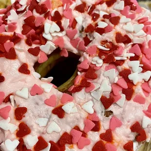 a frosted donut with sprinkles