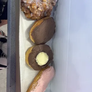 Apple-fritter, custard filled, cream cheese filled, and a strawberry flavored long John...all were delicious!