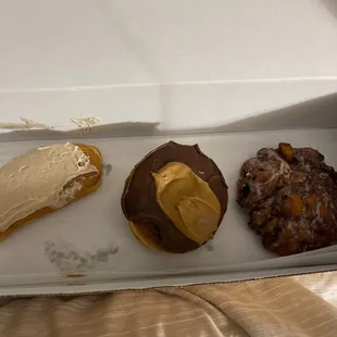 Maple long John.  Doughnut with chocolate frosting and PB in the middle.  Apple fritter.