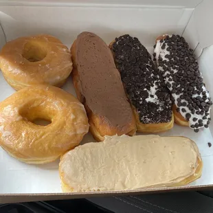 Glazed, cream filled, Oreo, chocolate chip and maple nut donuts