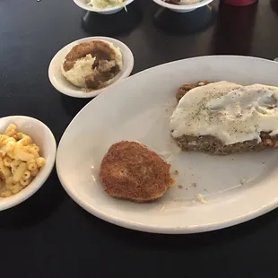 Country fried steak with white gravy, mashed potatoes with brown gravy, and mac and cheese with flap jack corn bread .... fantastic