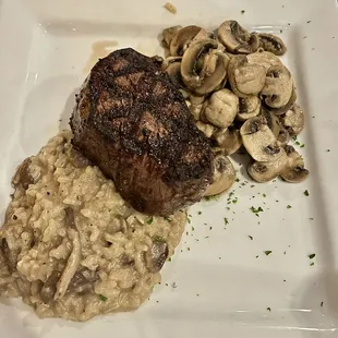 Filet mignon with risotto and sauteed mushrooms