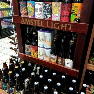 a shelf full of beer bottles